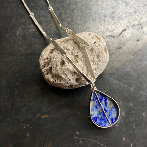 
                
                    Load image into Gallery viewer, Captured Lapis Teardrop and Hammered Bar Chain Necklace
                
            