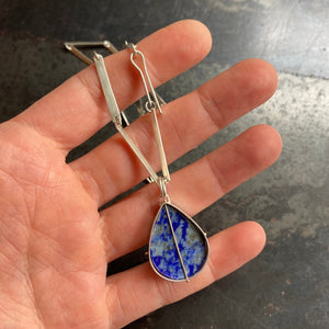 
                
                    Load image into Gallery viewer, Captured Lapis Teardrop and Hammered Bar Chain Necklace
                
            