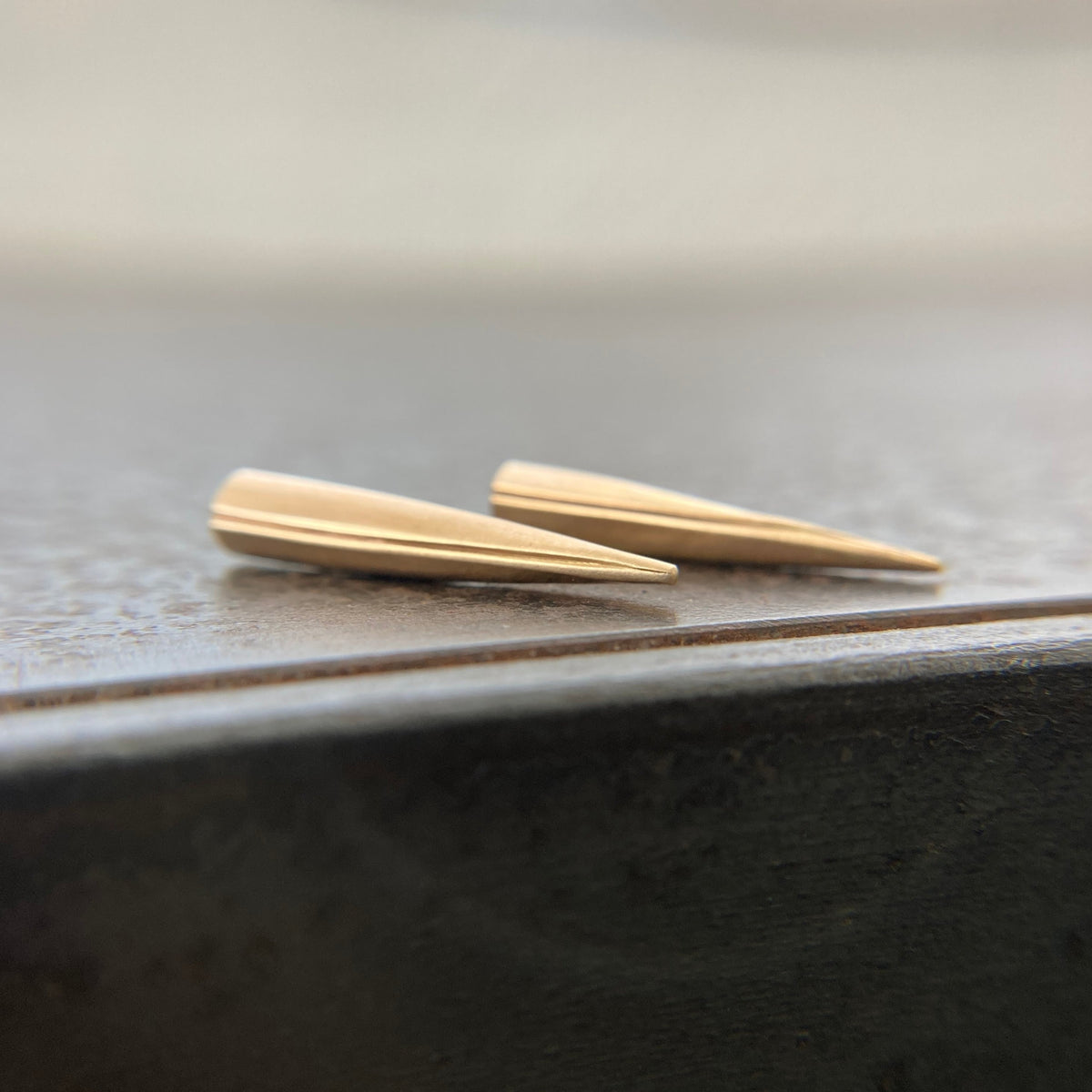 spike studs, spike jewelry, gold earrings, gold spikes, hilary finck jewelry, handmade jewelry, fine jewelry, edgy jewelry, luxury jewelry, gold jewelry.