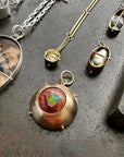 Captured Fire Opal Charm
