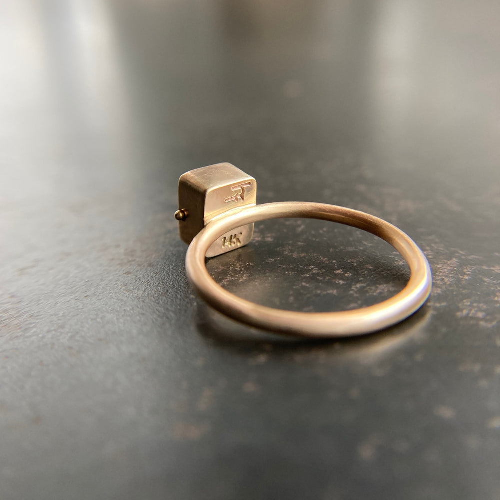 Captured Garnet Ring