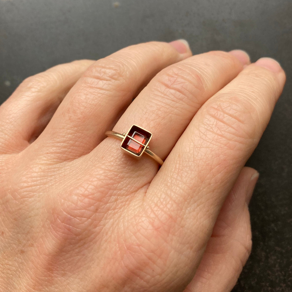 Captured Garnet Ring