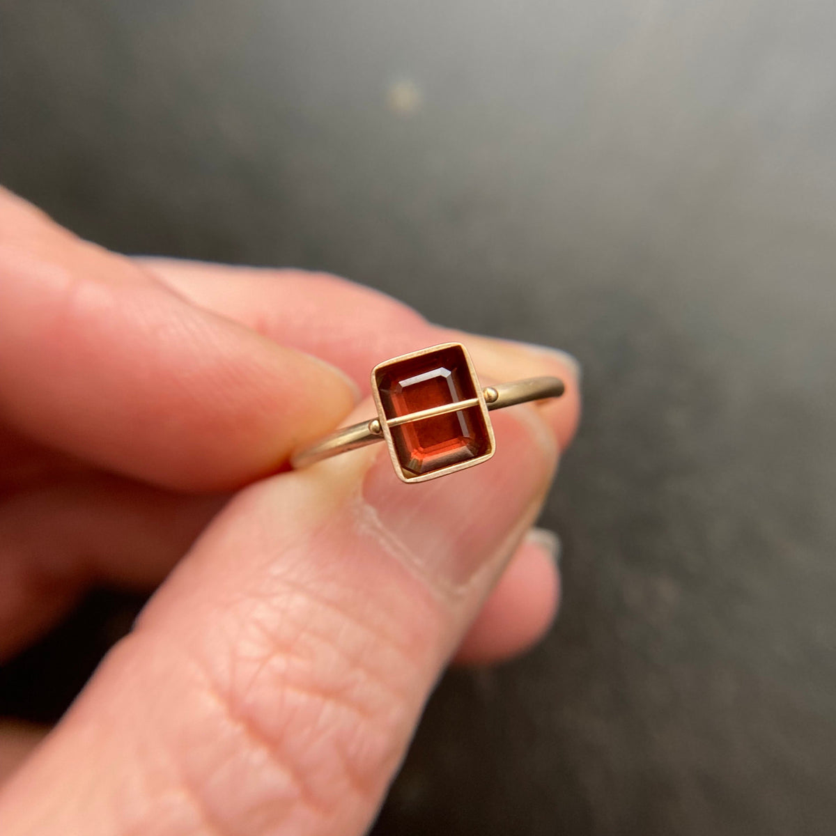 Captured Garnet Ring