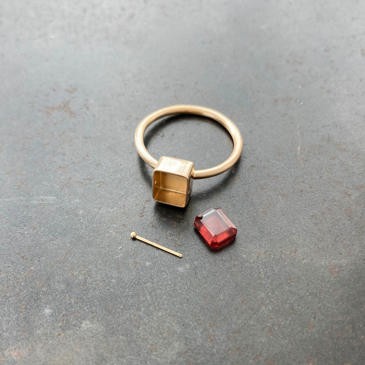 Captured Garnet Ring