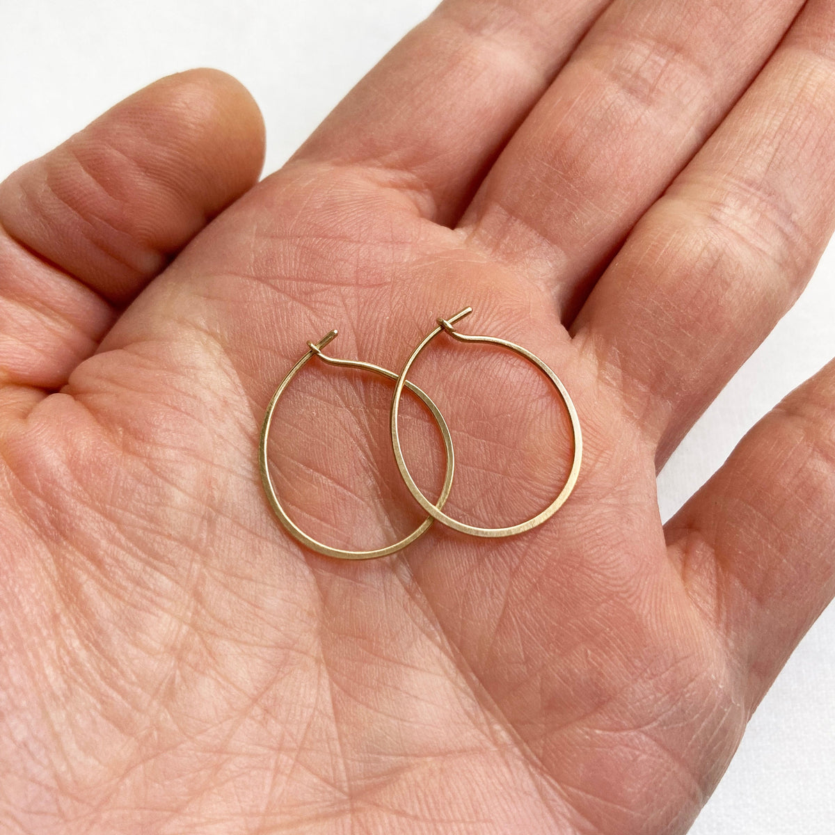 hammered gold hoop earrings, 18k hoops, gold jewelry, gold hoops, hilary finck jewelry, hoop earrings, handmade jewelry.