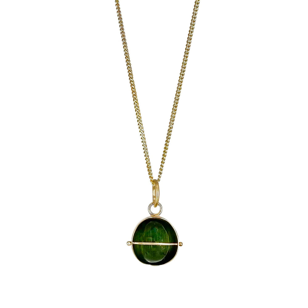
                
                    Load image into Gallery viewer, Captured Cat&amp;#39;s Eye Tourmaline Charm
                
            